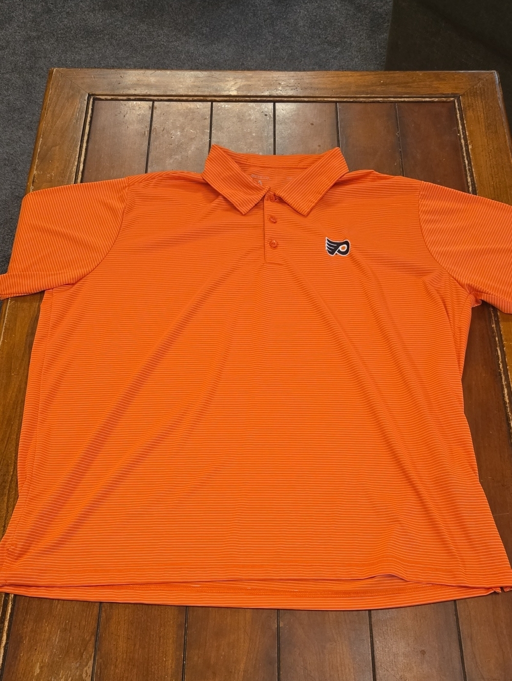 Phila Flyers Antigua Orange Striped Short-Sleeve Polo with Team Crest